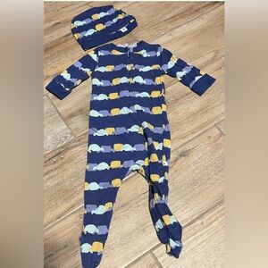 Mother’s promise footed onesie and matching hat.